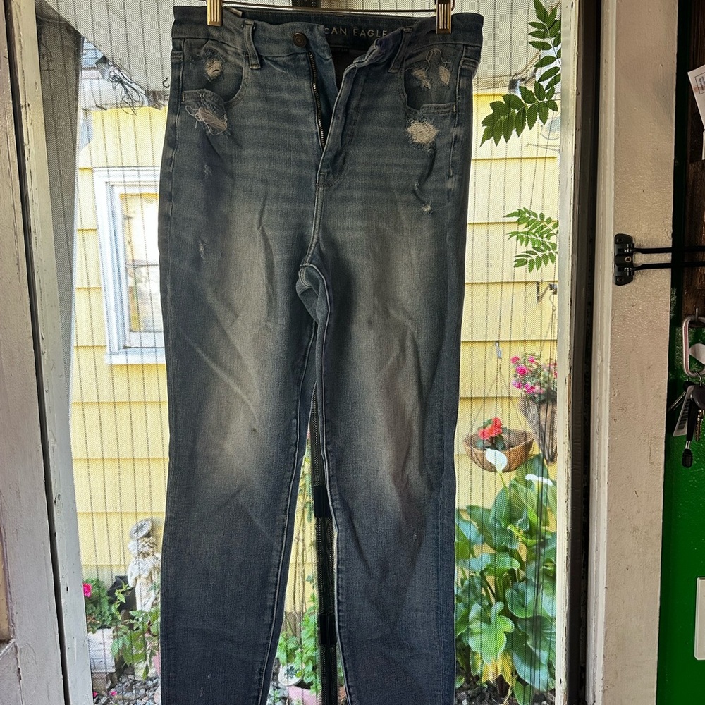 American Eagle light blue distressed skinny jeans